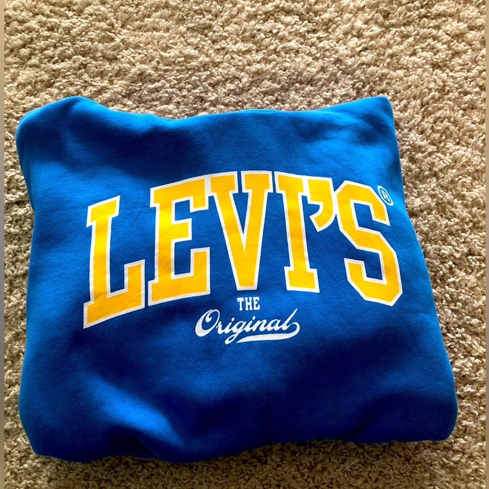 Levi’s small blue hoodie, originally $80. Never worn and in perfect condition.